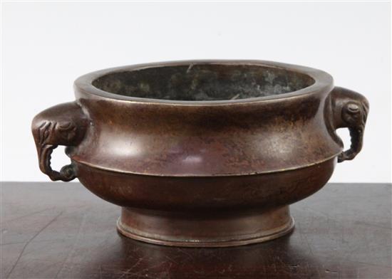 A Chinese bronze two handled censer, Gui, width 15cm